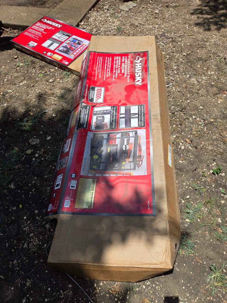 Box of Husky 4-Tier Industrial Steel Shelving Unit for assembly by Mount & Fix Dallas