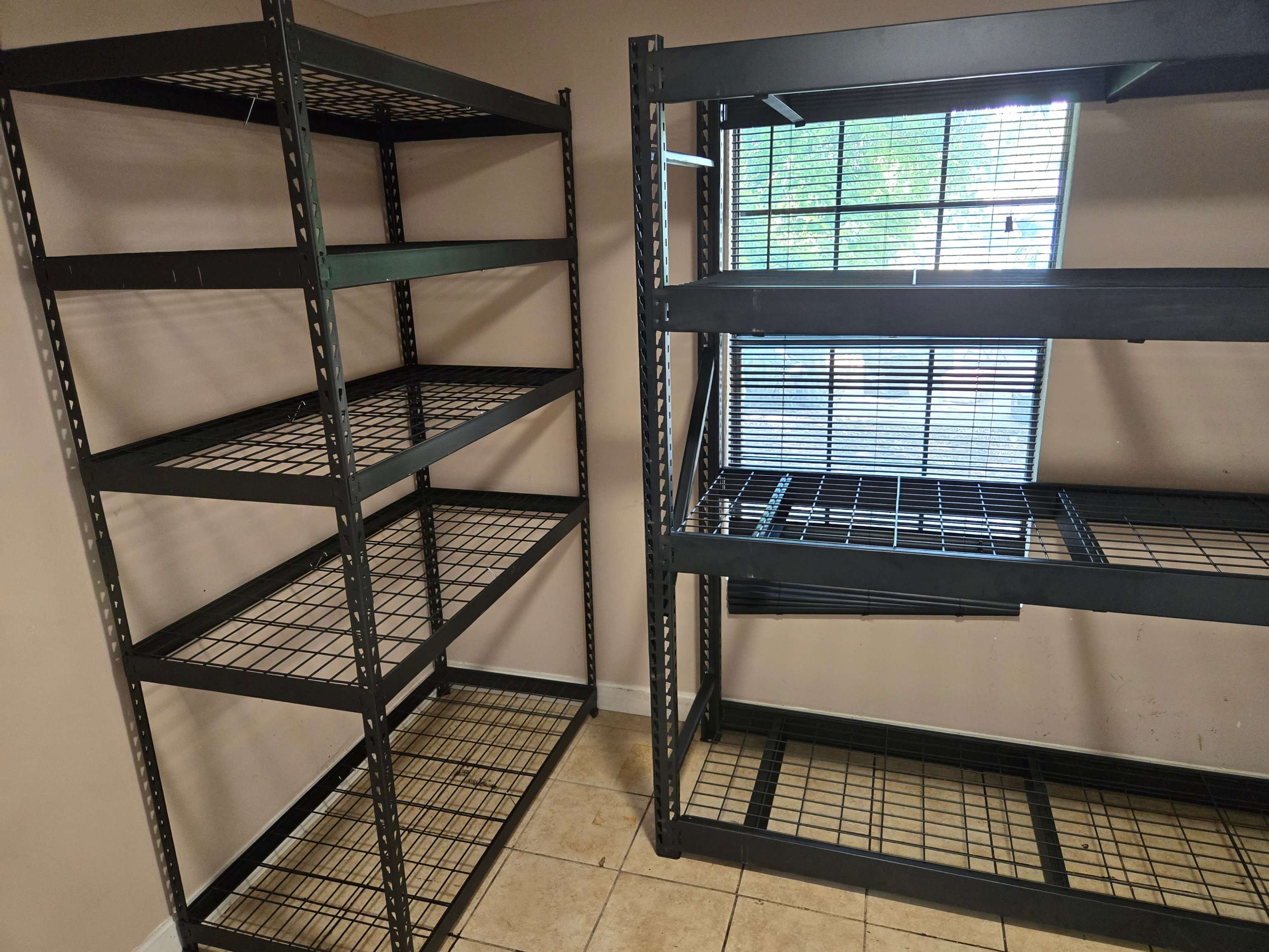 Two assembled Husky industrial steel shelving units by Mount & Fix Dallas
