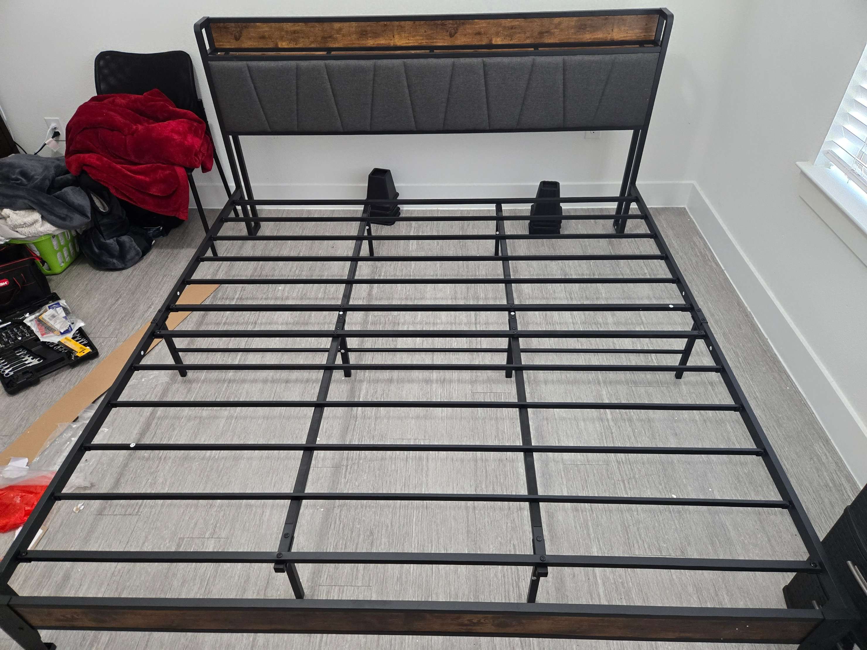 Industrial iron Queen size bed frame assembly by Mount & Fix in Dallas